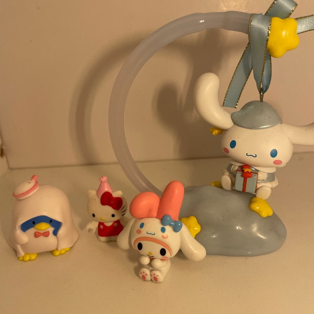 assorted sanrio toys (my melody, cinnamoroll)